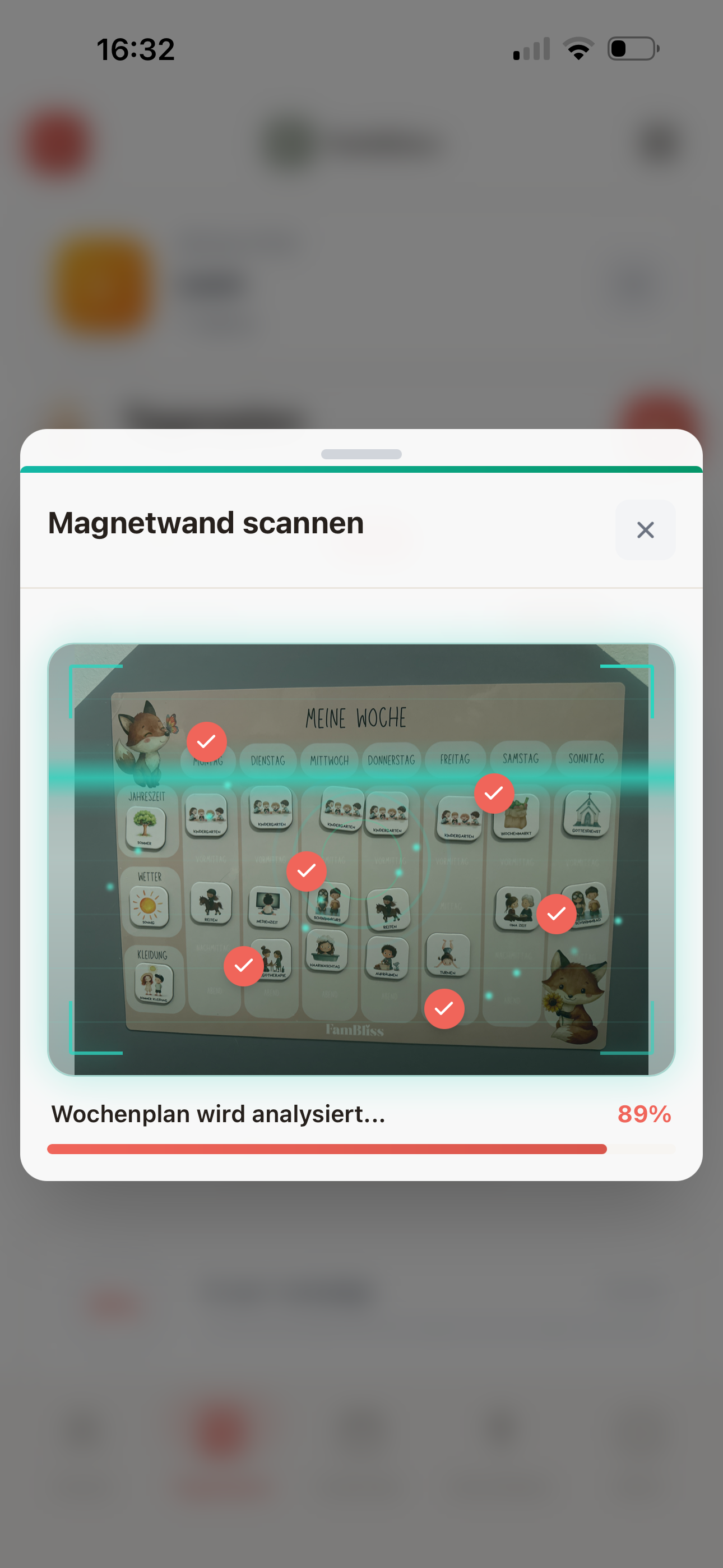 FamBliss+ App scannt die bestückte Fambliss Magnetwand